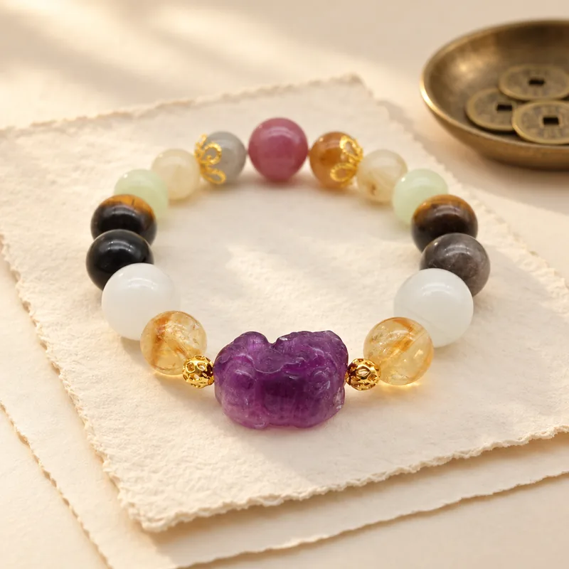 Pixiu Wealth bracelet styled on handmade paper
